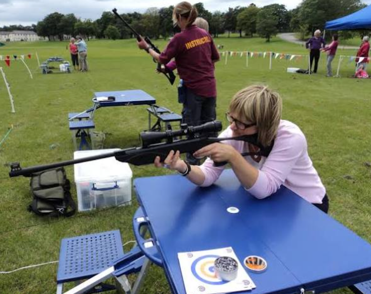 Group enjoying an outdoor airgun shooting session